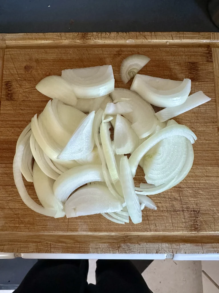 chopped onion on a wooden board