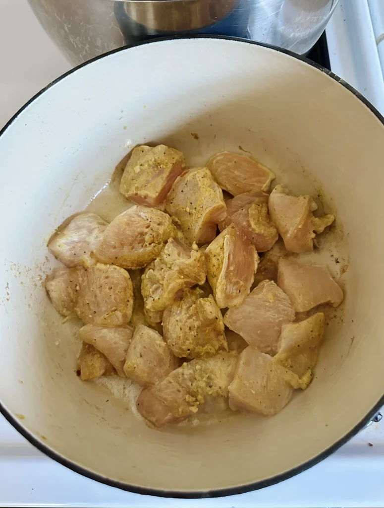 browning chicken in pot