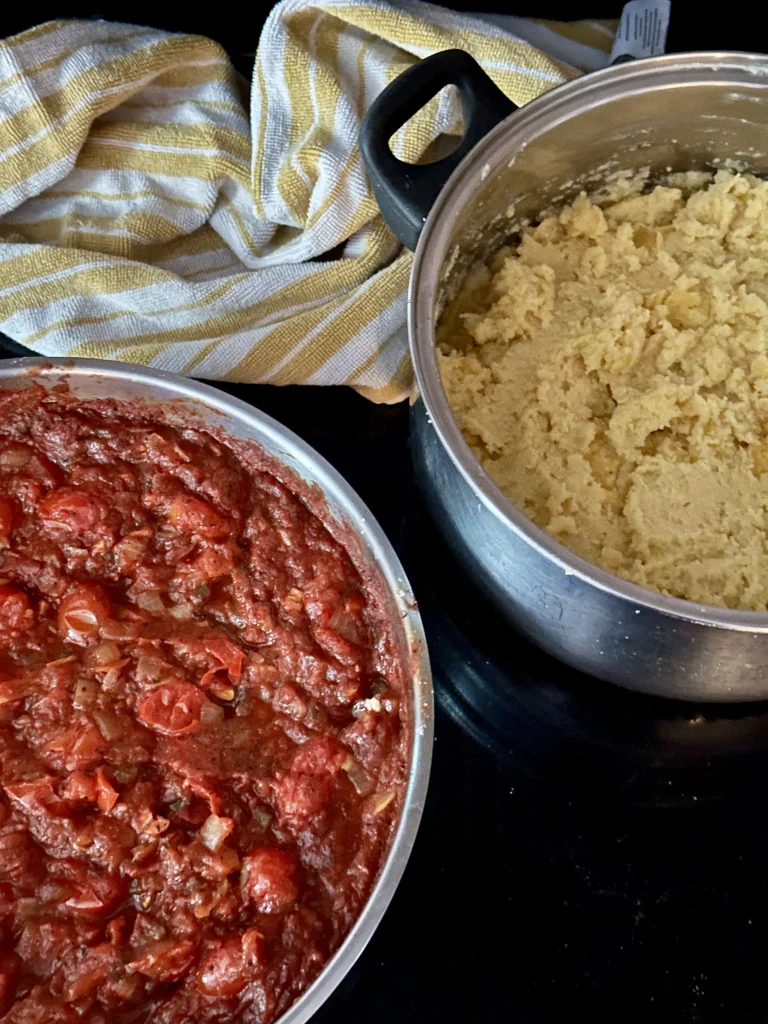 pap and sauce finished product in stainless steel pots